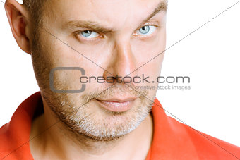 strict unshaven man on a white background. close up