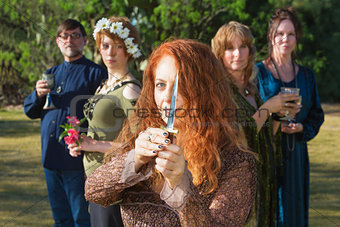 Female Pagan with Athame Outdoors
