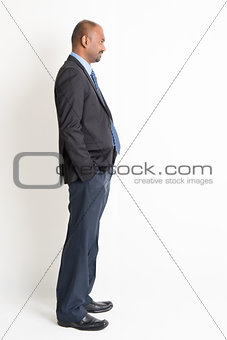 Side view mature Indian businessman