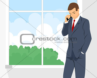 Businessman talking by phone