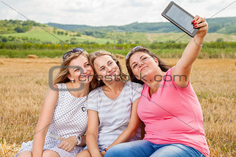 Three best friends taking a selfie