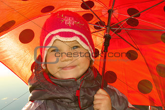 Positive girl with umbrella