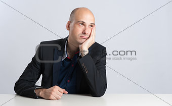 businessman thinking at office desk