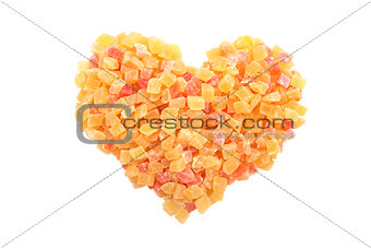 Dried pineapple and papaya in a heart shape