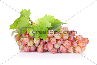 Bunch of red grapes with leaves