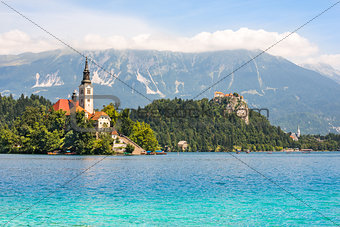 Catholic Church on Island on Bled Lake and Bled Castle