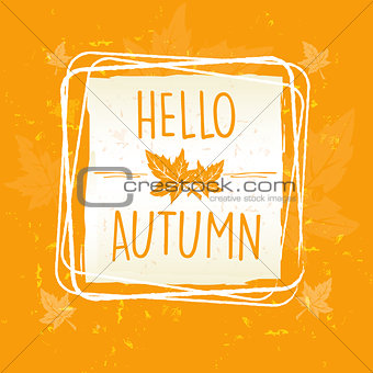 hello autumn in frame with leaves over yellow orange old paper b