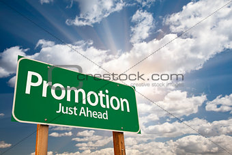 Promotion Green Road Sign Over Clouds