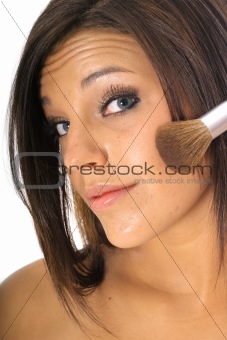shot of a beautiful girl putting on makeup