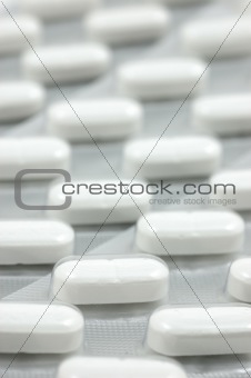 Headache pills background