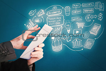 Composite image of businessman scrolling on his digital tablet