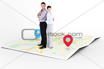 Composite image of office workers standing up back to back