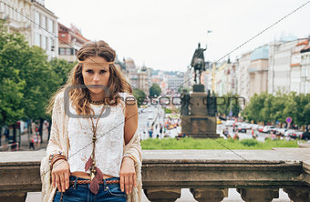Bohemian woman tourist standing on Wenceslas Square, Prague