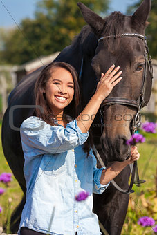 Beautiful Asian Eurasian Girl Leading Her Horse