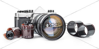 Vintage camera and film isolated on a white  background