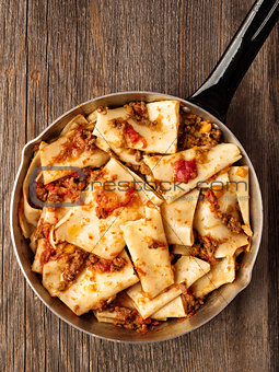 rustic italian pasta in ragu sauce