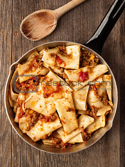 rustic italian pasta in ragu sauce