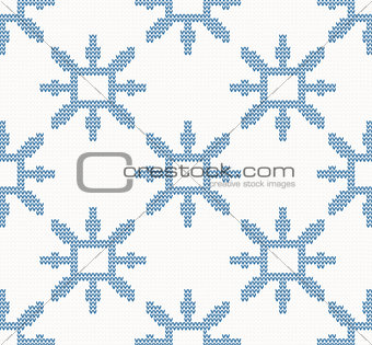 Christmas knitted seamless pattern with blue snowflakes