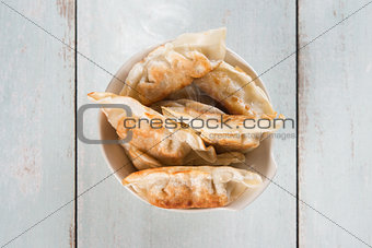 Top view Asian gourmet pan fried dumplings