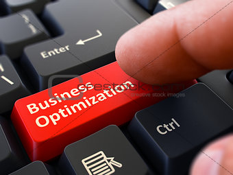 Business Optimization - Written on Red Keyboard Key.