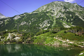 Reflection of Muratov peak in Okoto lake