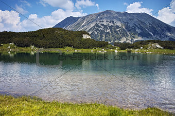 Reflection of Todorka peak in Muratovo lake, Pirin Mountain