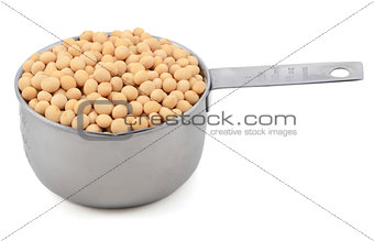 Soybeans, or soya beans, in a measuring cup