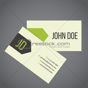 Business card design with green arrow ribbon