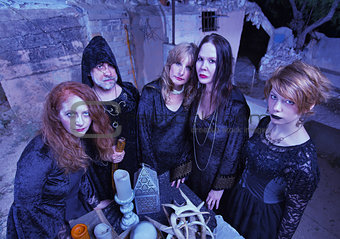 Coven of Witches at Altar