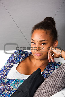 Teenage girl in couch