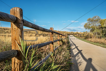 wooden fence and bike trail