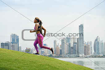 Woman Running And Working Out At Morning In The City