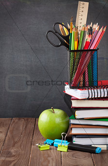 School and office supplies and apple