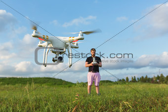 Person with Drone in Field