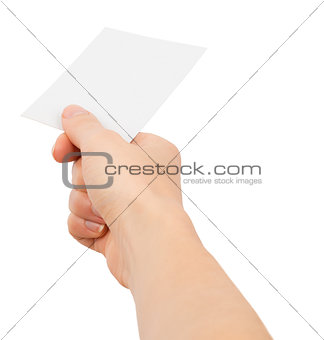 Womans hand giving small blank paper