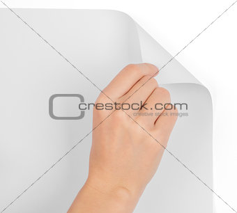 Womans hand turning blank page