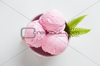 Top view pink ice cream in bowl
