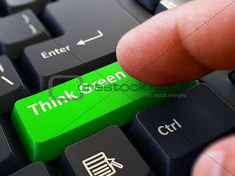 Pressing Button Think Green on Black Keyboard.
