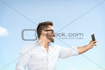 man taking selfie