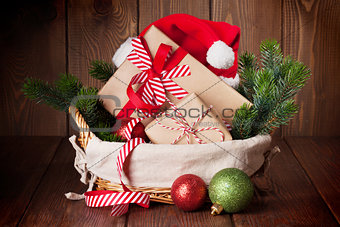 Christmas gifts and tree branch