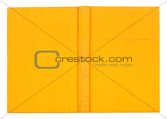Vintage textile yellow book on an isolated white background