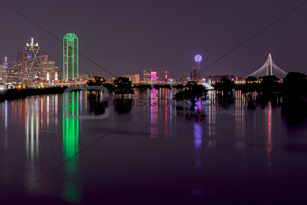 Skyline of Dallas, Texas at Night across Flooded Trinity River
