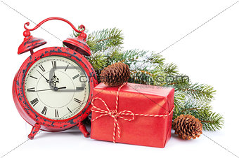 Christmas clock, gift box and snow fir tree