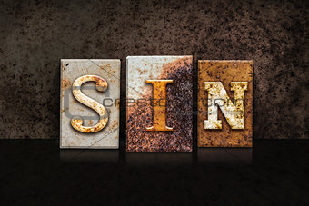 Sin Letterpress Concept on Dark Background