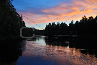 Pink twilight. Pongoma river. Karelia, Russia