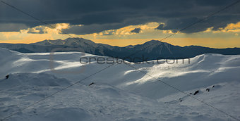 winter landscape with dark cloud