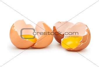 Broken eggs isolated on white background