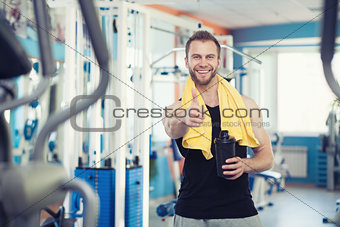 young man in sport gym club