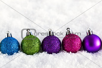 Christmas balls on the snow 