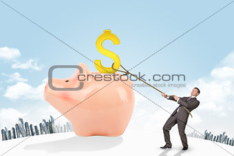 Businessman holding dollar sign with rope and city